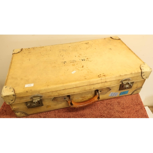 173 - Quality vintage vellum pig skin suitcase with carry handle and various labels (72cm x 40cm x 19cm)