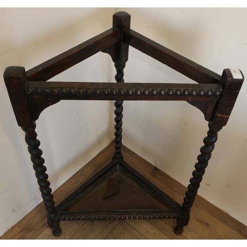 225 - Early - mid 20th C oak corner stick stand on barley twist supports, with lift out metal tray