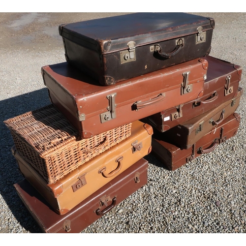 54 - Collection of seven vintage suitcases and a wicker picnic basket (8)