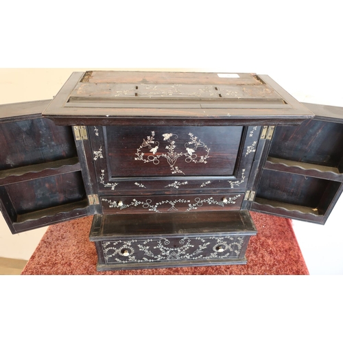 6 - 19th C ebonised table cabinet with bone inlay enclosed by two carved doors with internal shelf secti... 