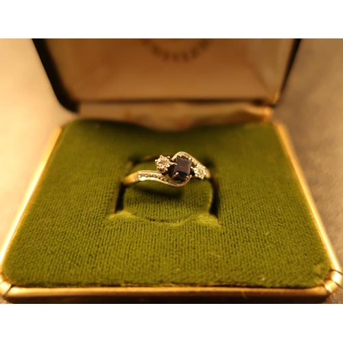 111 - 18ct gold and platinum diamond and sapphire ring