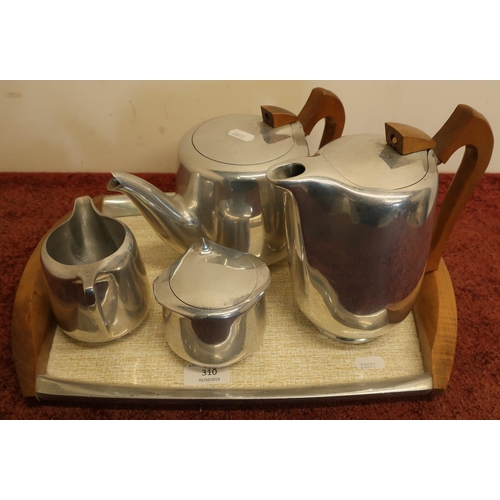 310 - Picquot ware five piece tea set comprising of twin handled tray, teapot, hot water jug, milk jug and... 