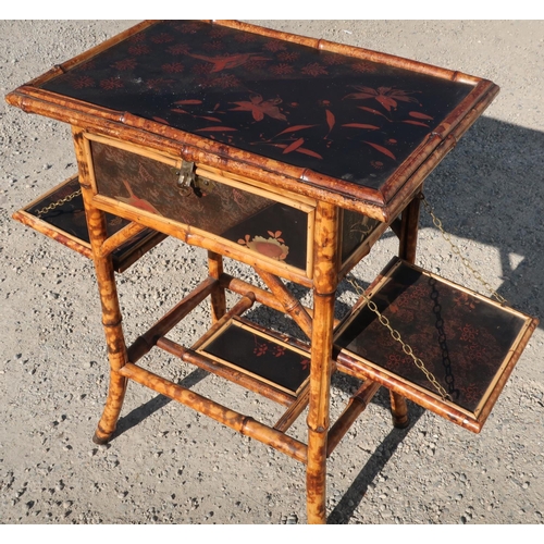 317 - Late Victorian bamboo and lacquered sewing/side table with single drawer and two folding shelves wit... 