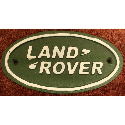 330 - Small cast metal oval land rover sign (17cm x 9cm)