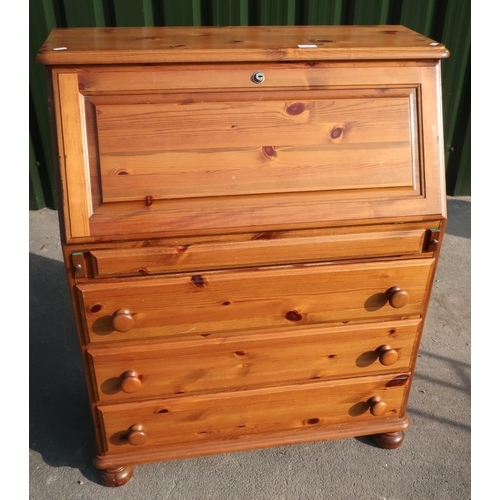 85 - Modern pine bureau of fall front above three drawers on bun feet (width 86cm)