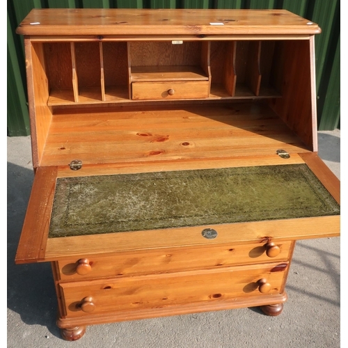 85 - Modern pine bureau of fall front above three drawers on bun feet (width 86cm)