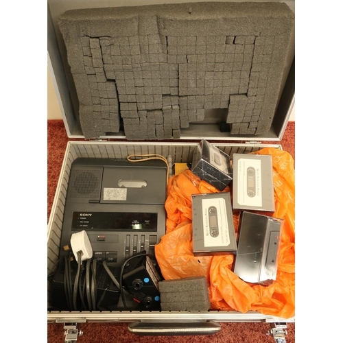 339 - Aluminium flight type case with a selection of interview recording equipment