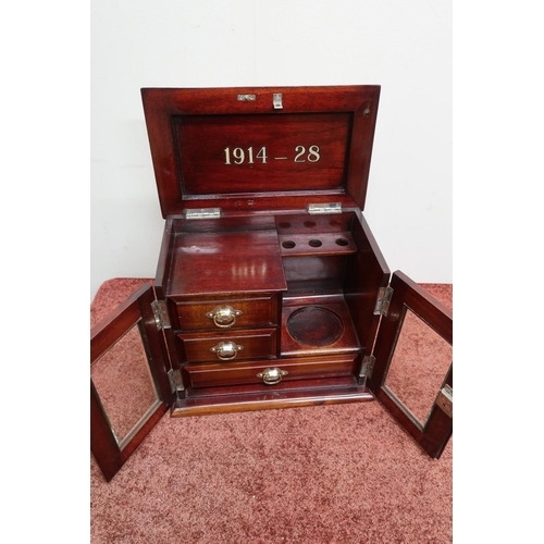 579 - Early 20th C mahogany presentation smokers cabinet with hinged top, with oval plaque presented to Br... 