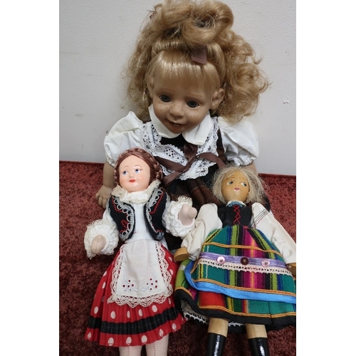 532 - Three vintage costume dolls