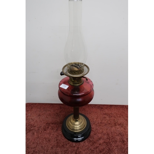 578 - Late Victorian brass and cranberry glass reservoir oil lamp