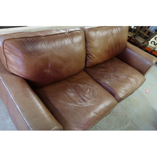 95 - Quality modern tan leather two seat sofa (width 200cm)