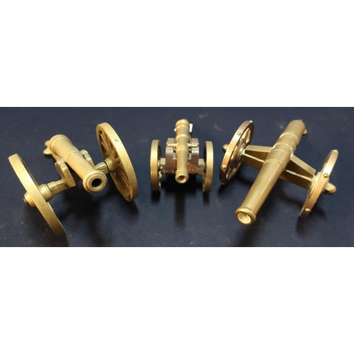 41 - Group of three brass model cannons of various design