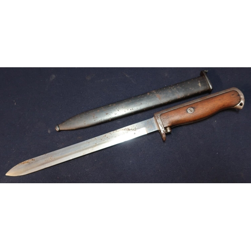 57 - Norwegian M1894 bayonet with 8 inch blade, wooden grip and steel sheath stamped 15647