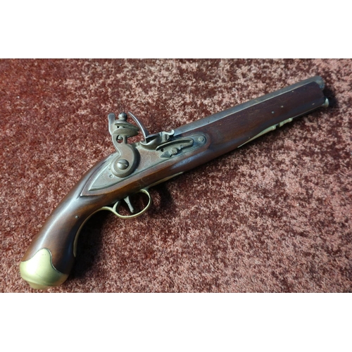 111 - Reproduction flintlock Victorian tower pistol with 9 inch barrel and brass mounts