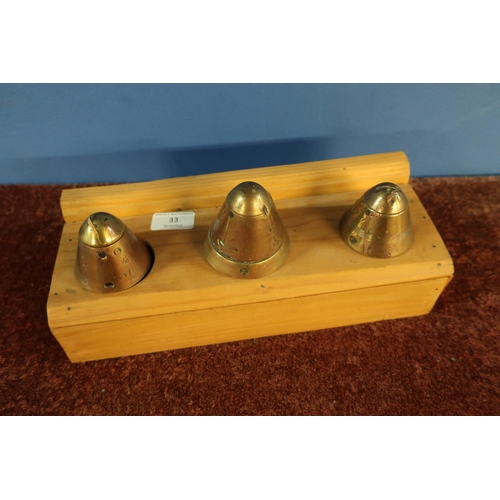 33 - Three WWI mounted fuse nose cones