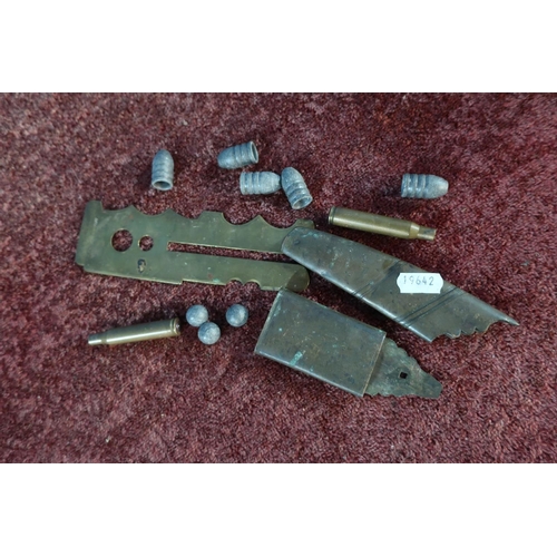46 - Brass button slide polisher, mounts from a naval sword, inert ammunition and bullet heads