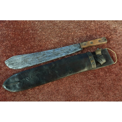 59 - Samuel Kitchen of Sheffield 1918 military issue machete with two piece grips and leather sheath mark... 