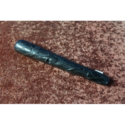 66 - Carved Irish bog oak cosh, carved with harp and shamrocks (overall length 25.5cm)