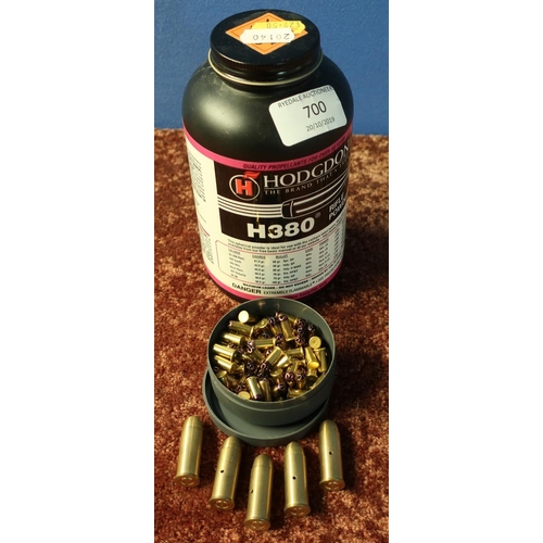 700 - Part tin of Hodgdon H380 rifle powder, 5 inert rounds and a box of primers (relevant licences requir... 