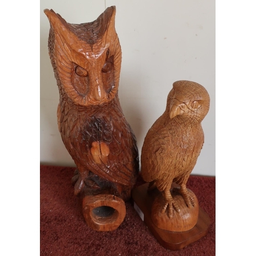26 - Carved oak figure of a buzzard (height 29cm) and another carved wood figure of an owl (2)