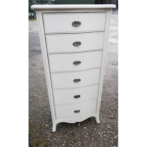 127 - Modern cream serpentine front chest of six drawers (65cm x 45cm x 136cm)