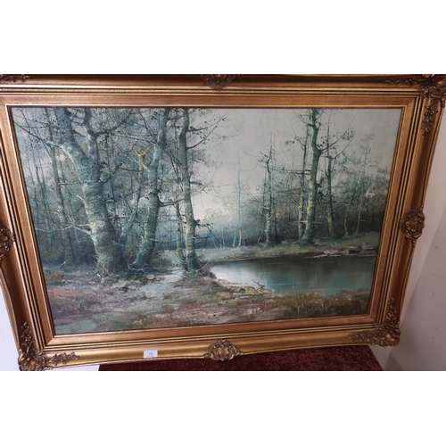 206 - Contemporary oil on canvas depicting an autumnal wooded landscape, signed