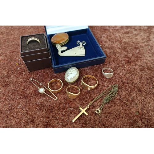 235 - Gents gold signet ring stamped 375, gold crucifix stamped 375, small gold signet ring stamped 375, c... 