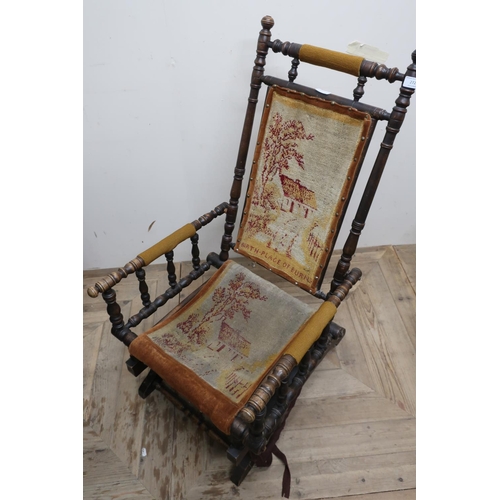 272 - Victorian American style rocking chair with upholstered seat, back and arms on turned supports