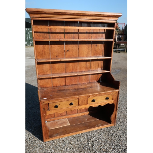 277 - 19th C rustic country style pine dresser with three tier raised back with planked detail above two d... 