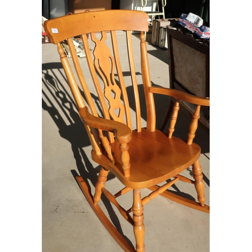 284 - Modern beech farmhouse style rocking chair on tuned supports and double H shaped under stretcher