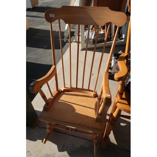 285 - Modern beech light wood stick back rocking chair on turned supports