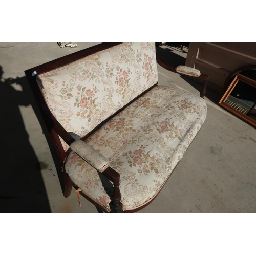 286 - 19th C mahogany framed two seat settee with upholstered seat, back and arms on turned supports (widt... 