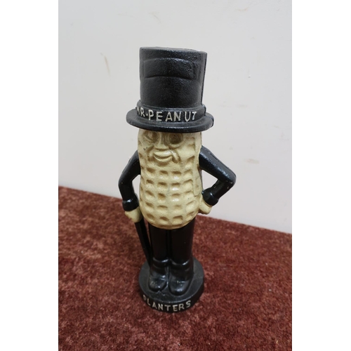 297 - Cast metal Mr Peanut man money box (height 27cm)