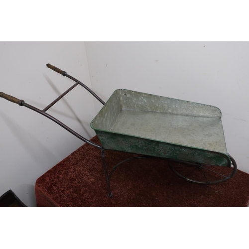 298 - Small metal contrasted wheelbarrow with turned wood handles