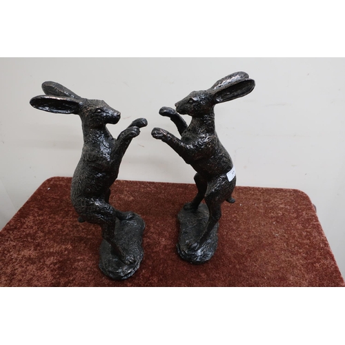 306 - Pair of composite figures of boxing hares (height 39cm)