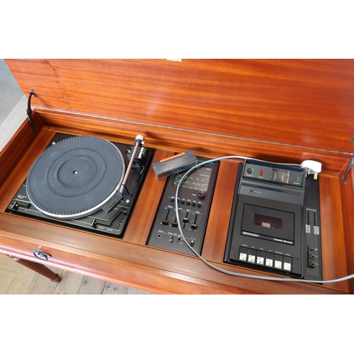 335 - Dynatron Music System set in mahogany cabinet with two free standing mahogany cased speakers