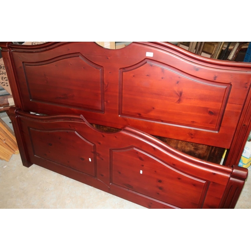 339 - Modern dark stained pine double bedstead