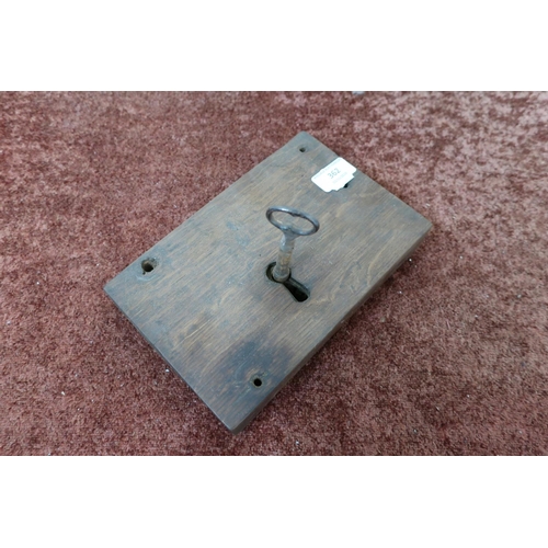 362 - 18th/19th C oak encased door lock and key