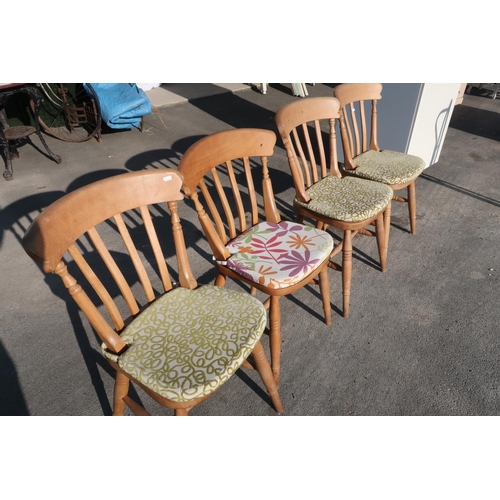 375 - Set of four beech farmhouse style kitchen chairs on turned supports and H shaped under stretchers