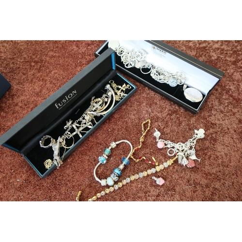 404 - Selection of various assorted costume jewellery including various silver jewellery, lockets, bracket... 