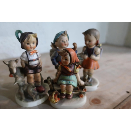 145 - Group of four Goebel (Hummel) figures