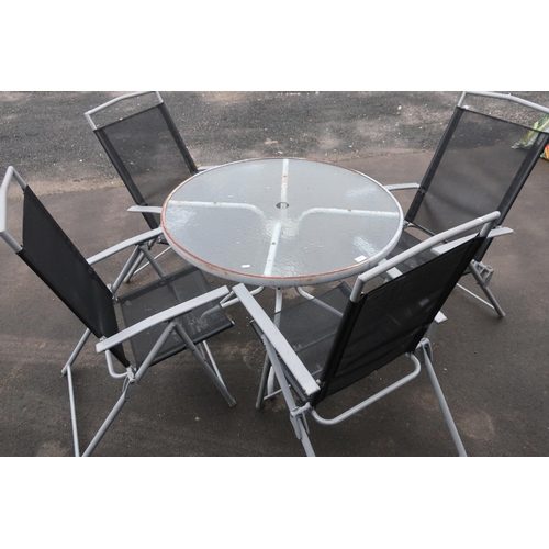 1 - Set of four garden chairs with glass topped table