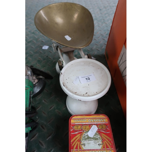 10 - Set of kitchen scales with brass dish and a tin containing various weights