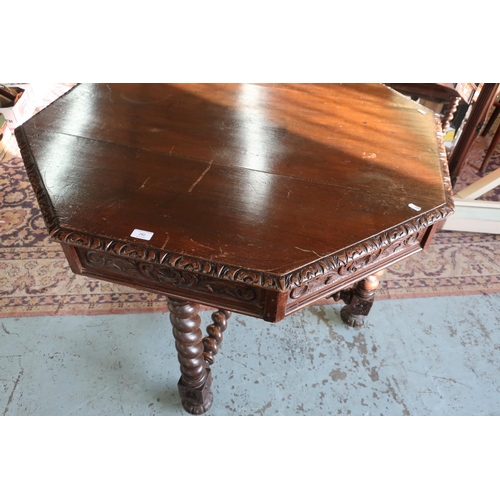 91 - Oak octagonal dining table with carved detail, X shaped stretcher and barley twist supports (diamete... 