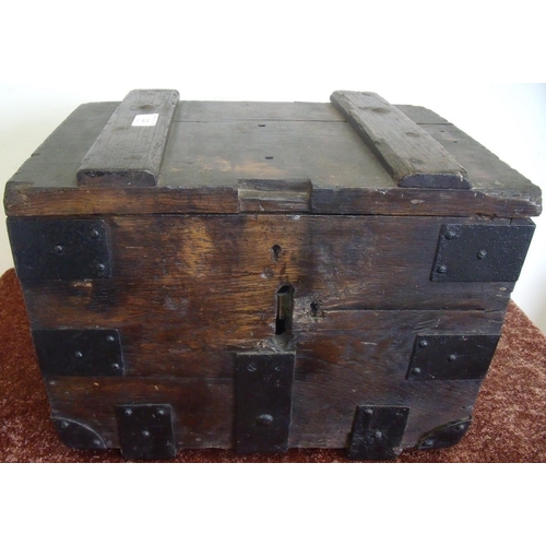 109 - Oak bank style cash/deed strongbox with metal strapwork detail and hinges, twin carrying handles and... 