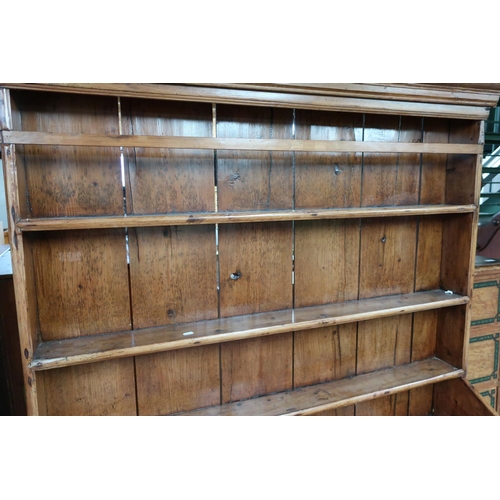 104 - 19th C rustic country style pine dresser with three tier raised back with planked detail above two d... 