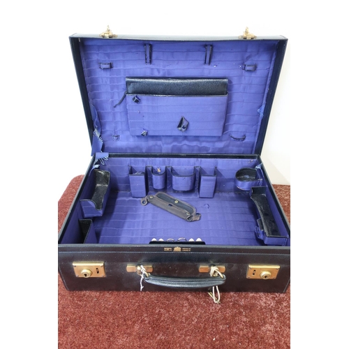 119 - Mappin & Webb black leather travelling vanity case with outer weather cover and fitted interior with... 