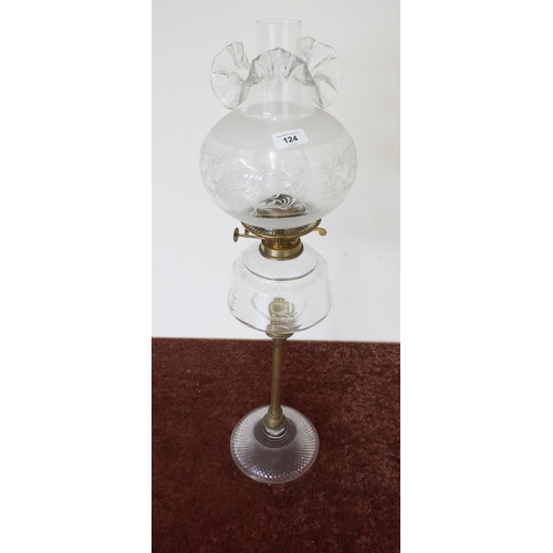 124 - Victorian oil lamp with domed diamond pattern base, brass column, clear reservoir and etched clear g... 