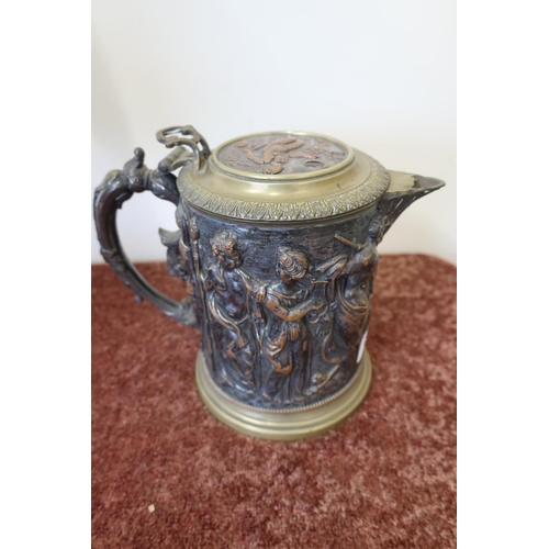 128 - Late 19th C copper and silver plated jug with hinged lift up top, the body decorated with elaborate ... 