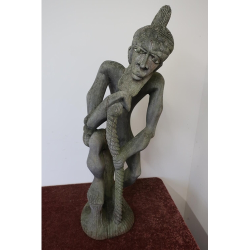 129 - Large carved wood African tribal style figure of an elderly gentleman with rope twist stick (approx ... 